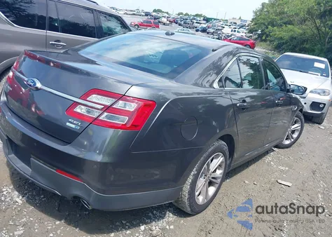 2015 Ford Taurus Sel z USA, uszkodzony, nr VIN 1FAHP2H82FG177210